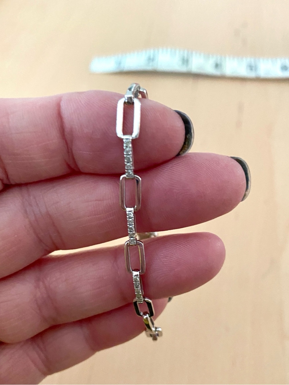 Sterling silver paper lip link bracelet with small round diamonds 7”